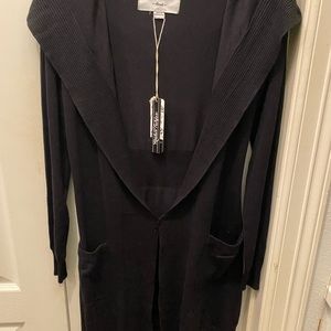 New with tags long black sweater.